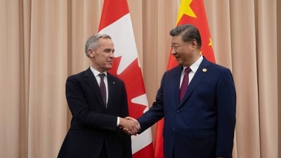 Canadian Prime Minister Mark Carney, left, shakes hands with Chinese President Xi Jinping. (AP) Canadian Prime Minister Mark Carney, left, shakes hands with Chinese President Xi Jinping. (AP)