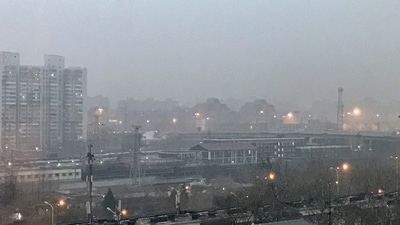Smog shrouds residential high-rises and railway tracks as air pollution reduces visibility in the city, in Beijing, China, Thursday, Dec. 18, 2025. (PTI Photo) (PTI) Smog shrouds residential high-rises and railway tracks as air pollution reduces visibility in the city, in Beijing, China, Thursday, Dec. 18, 2025. (PTI Photo) (PTI)