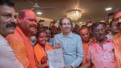 iMumbai, India - January 16, 2026: Shiv Sena UBT chief Uddhav Thackeray greets winning candidates from Dharavi area such as T.M. Jagdish, Archana Avirat Shinde, Joseph Koli and their followers, at Thackeray's residence at Bandra east in Mumbai, India, on Friday, January 16, 2025. (Photo by Satish Bate/ Hindustan Times) (Hindustan Times) iMumbai, India - January 16, 2026: Shiv Sena UBT chief Uddhav Thackeray greets winning candidates from Dharavi area such as T.M. Jagdish, Archana Avirat Shinde, Joseph Koli and their followers, at Thackeray's residence at Bandra east in Mumbai, India, on Friday, January 16, 2025. (Photo by Satish Bate/ Hindustan Times) (Hindustan Times)