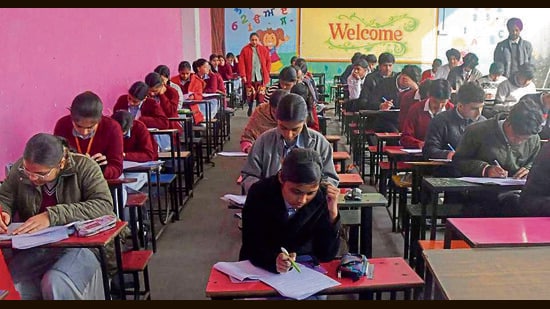 Students during their pre-board examination at government senior secondary school, Cemetery Road in Ludhiana on Friday. (Manish/HT)