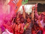 BJP workers celebrate as the party leads during counting of votes for the Solapur Municipal Corporation elections, in Solapur, Maharashtra, on Friday. BJP registers a crushing victory in western Maharashtra, sweeping key urban civic bodies and pushing the Congress, NCP and other opposition parties to the margins in most cities. (PTI)