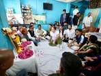 Congress leader Rahul Gandhi with the families of victims of Indore water contamination. Congress leader Rahul Gandhi with the families of victims of Indore water contamination.