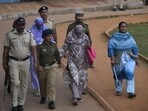 Sonali Vanraj Andekar and Laxmi Udaykant Andekar (wearing scarves) were arrested in connection with the murder of Ayush Komkar and are facing judicial proceedings. Voters in ward number 23 (Raviwar Peth-Nana Peth) elected the two members of the Andekar family who contested the civic polls from jail. (HT FILE)