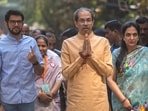 Shiv Sena (UBT) chief Uddhav Thackeray, along with his family members, poses for photographs after casting his vote in the BMC elections