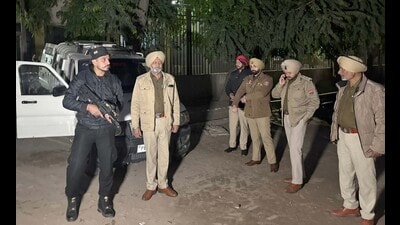 Police outside a court in Ludhiana where gangster Kaushal Chaudhary was brought on a stretcher after fracturing both legs in failed escape bid on Saturday. (HT Photo) Police outside a court in Ludhiana where gangster Kaushal Chaudhary was brought on a stretcher after fracturing both legs in failed escape bid on Saturday. (HT Photo)