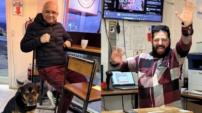 A Mumbai man visiting Argentina shared how a cafe owner eased his fear of dogs and played Bollywood songs. (X/@BMTheEquityDesk) A Mumbai man visiting Argentina shared how a cafe owner eased his fear of dogs and played Bollywood songs. (X/@BMTheEquityDesk)
