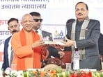 CM Yogi Adityanath and CJI Surya Kant in Chandauli on Saturday (HT)