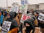 People march and gather near the post office during a protest, Sunday, Jan. 18, 2026, in Minneapolis. (AP Photo/Yuki Iwamura) People march and gather near the post office during a protest, Sunday, Jan. 18, 2026, in Minneapolis. (AP Photo/Yuki Iwamura)
