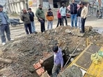 Civic body officials during a routine inspection in Ludhiana on Sunday. (HT Photo)