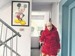 Everyday, the woman gets up and dresses in a suit, a sweater and her super-warm red jacket. (Mayank Austen Soofi)