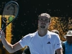 Alexander Zverev celebrates after his victory against Canada's Gabriel Diallo during their men's singles match on day one of the Australian Open