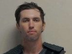 A police mugshot shows Tyler Robinson, the suspect in the fatal shooting of US conservative commentator Charlie Kirk during an event at Utah Valley University, in Orem, Utah.
