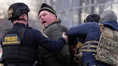 Law enforcement detain a man outside the Bishop Henry Whipple Federal Building during a protest on Saturday, Jan. 17, 2026, in Minneapolis. (AP Photo/Yuki Iwamura) (AP) Law enforcement detain a man outside the Bishop Henry Whipple Federal Building during a protest on Saturday, Jan. 17, 2026, in Minneapolis. (AP Photo/Yuki Iwamura) (AP)