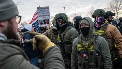 Demonstrators near federal law enforcement officers during a protest outside the Bishop Henry Whipple Federal Building in St. Paul, Minnesota, US, on Saturday, Jan. 17, 2026. (Photographer: Victor J. Blue/Bloomberg) (Bloomberg) Demonstrators near federal law enforcement officers during a protest outside the Bishop Henry Whipple Federal Building in St. Paul, Minnesota, US, on Saturday, Jan. 17, 2026. (Photographer: Victor J. Blue/Bloomberg) (Bloomberg)