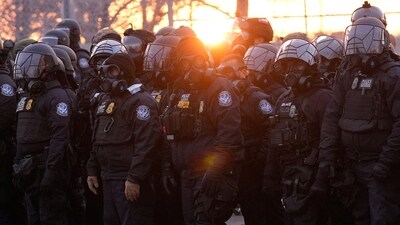 Federal law enforcement stand outside the Bishop Henry Whipple Federal Building during a protest on Saturday, Jan. 17, 2026, in Minneapolis. (AP Photo/Yuki Iwamura) (AP) Federal law enforcement stand outside the Bishop Henry Whipple Federal Building during a protest on Saturday, Jan. 17, 2026, in Minneapolis. (AP Photo/Yuki Iwamura) (AP)