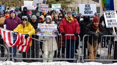 Demonstrators protest against the ICE near City Hall with signs on January 17, 2026 in Minneapolis, Minnesota. (Photo by Jim Vondruska / GETTY IMAGES NORTH AMERICA / Getty Images via AFP) (Getty Images via AFP) Demonstrators protest against the ICE near City Hall with signs on January 17, 2026 in Minneapolis, Minnesota. (Photo by Jim Vondruska / GETTY IMAGES NORTH AMERICA / Getty Images via AFP) (Getty Images via AFP)