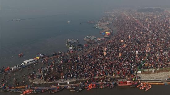 An aerial view of devotees bathing at Sangam on the occasion of Mauni Amavasya during the ongoing Magh Mela in Prayagraj on Sunday. (HT)