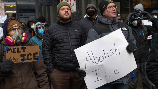 MINNEAPOLIS, MINNESOTA - JANUARY 17: Demonstrators protest the Trump administration's efforts to deport undocumented immigrants on January 15, 2026 in Minneapolis, Minnesota. (Photo by SCOTT OLSON / GETTY IMAGES NORTH AMERICA / Getty Images via AFP)(Getty Images via AFP)