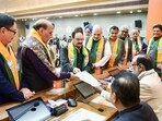BJP National President JP Nadda, Union Ministers Amit Shah, Rajnath Singh, Nitin Gadkari, Kiren Rijiju, and other senior leaders proposing the name of Nitin Nabin for BJP National President during the nomination process for the new BJP National President election, at BJP Headquarters in New Delhi. (@JPNadda X/ANI Photo)