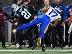Carolina Panthers safety Nick Scott (21) hits Los Angeles Rams wide receiver Davante Adams (17) in the head 