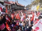 Himachal Pradesh Seb Utpadak Sangh and Himachal Kisan Sabha members protesting for their demands outside the Himachal Pradesh secretariat, in Shimla on Monday. (Deepak Sansta/HT)