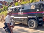 A police official stands guard amid tight security during an ongoing anti-terror operation, in Kishtwar, Jammu and Kashmir. (PTI Photo) 