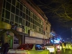 Motorists ride past a building with shattered glass following an explosion in the Shahr-e Naw area of Kabul Motorists ride past a building with shattered glass following an explosion in the Shahr-e Naw area of Kabul