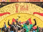 Sadio Mane holds the trophy after the AFCON final.(AFP)