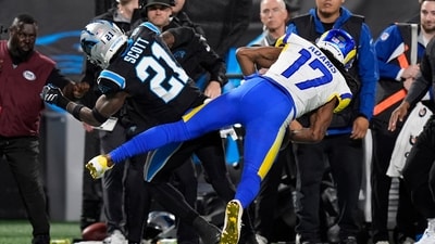 Carolina Panthers safety Nick Scott (21) hits Los Angeles Rams wide receiver Davante Adams (17) in the head (IMAGN IMAGES via Reuters Connect)