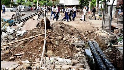 From uncovered manholes to broken pavements and live, unhinged electric supply lines, urban spaces are disaster zones that remain unattended by civic agencies. (HT Archive) From uncovered manholes to broken pavements and live, unhinged electric supply lines, urban spaces are disaster zones that remain unattended by civic agencies. (HT Archive)