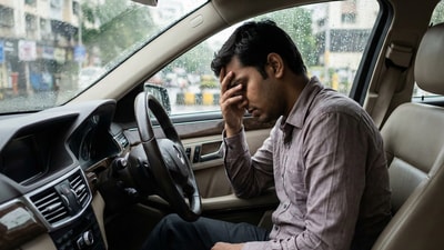 A man questioned buying an expensive car for validation. (Representational image/Gemini AI generated) A man questioned buying an expensive car for validation. (Representational image/Gemini AI generated)