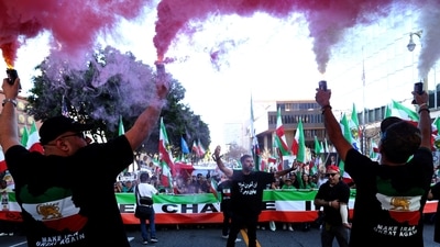 People march in support of nationwide protests in Iran, Los Angeles on January 18. Iranian protesters saw some hope when Trump said that “help is on its way” and with the news that the Pentagon had ordered some non-essential personnel from its largest Middle East air base. However, when Trump reversed course, they were disheartened. REUTERS/Jill Connelly (REUTERS)