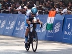 A cyclist takes part in the Bajaj Pune Grand Tour 2026, Monday. (PTI)