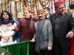 Chief minister Sukhvinder Singh Sukhkhu flagging off the procession of various cultural groups during the inauguration of Winter carnival festival at Manali on Tuesday. (Aqil Khan /HT)