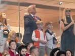 Kai Trump, United States President Donald Trump, and Ivanka Trump look on during the national anthem before the CFP National Championship college football game between the Indiana Hoosiers and the Miami Hurricanes at Hard Rock Stadium.
