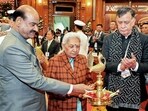 Lok Sabha Speaker Om Birla, UP governor Anandiben Patel light a ceremonial lamp during the 86th All India Presiding Officers’ Conference, in Lucknow. State Assembly Speaker Satish Mahana and deputy chairman Harivansh Narayan Singh also present. (ANI Photo)