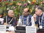 Lok Sabha speaker Om Birla (middle), Rajya Sabha deputy chairman Harivansh (left) and UP assembly speaker Satish Mahana during a session on the second day of AIPOC on Tuesday. (HT)