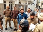 Police at the house of the businessman at Khatika Mohalla in Khanna on Monday. (HT Photo)