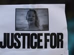 A poster demanding justice for Renee Nicole Good and Donald Trump at the White House on Tuesday.