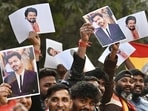 Supporters of TVK chief Vijay raise slogans as he reached CBI headquarters in connection with the Karur stampede case (HT File Photo/Sanchit Khanna)