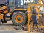 The pipe laying work being carried out in Kitchlu Nagar, Ludhiana, on Tuesday. (HT Photo)