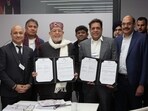 UP finance minister Suresh Khanna and delegation with AM Green group during MoU signing at WEF 26, Davos (HT Photo)