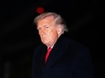 US President Donald Trump walks from Marine One to the White House in Washington, DC.