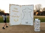Messages written by passersby cover an installation depicting a birthday message US President Donald Trump allegedly wrote to convicted sex offender Jeffrey Epstein, on the National Mall in Washington, DC.