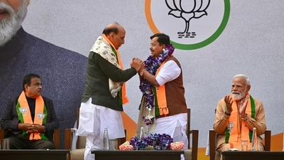 Union defence minister Rajnath Singh holds BJP's newly elected president Nitin Nabin's hands as he felicitates him during the swearing-in ceremony at BJP headquarters in Delhi on Tuesday. (Sanchit Khanna/Hindustan Times) Union defence minister Rajnath Singh holds BJP's newly elected president Nitin Nabin's hands as he felicitates him during the swearing-in ceremony at BJP headquarters in Delhi on Tuesday. (Sanchit Khanna/Hindustan Times)