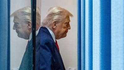 President Donald Trump departs after speaking with reporters at the White House, Tuesday, Jan. 20. (AP) President Donald Trump departs after speaking with reporters at the White House, Tuesday, Jan. 20. (AP)