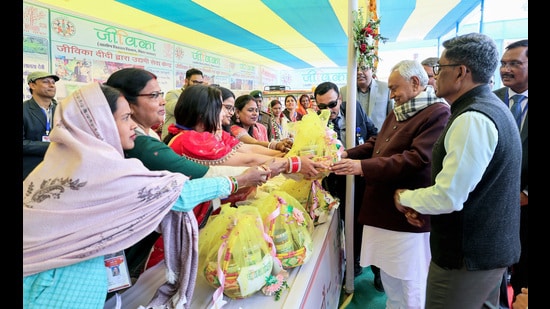 Bihar chief minister Nitish Kumar inspects the stall during the foundation stone and inauguration of various development schemes at Barouli block during the Samriddhi Yatra in Gopalganj on Tuesday. (Rahul Sharma/ANI)