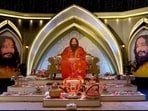 A lifesize cutout of Ashutosh Maharaj occupies the main chair at the satsang hall, signalling that he remains the functional head. (HT)