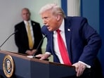 FILE PHOTO: US President Donald Trump speaks during a press briefing at the White House, on the one-year mark into his second term in office, in Washington.