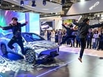 Performers drawing attention to a BYD Sealion 7 electric vehicle at the Singapore motor show in Singapore last year.